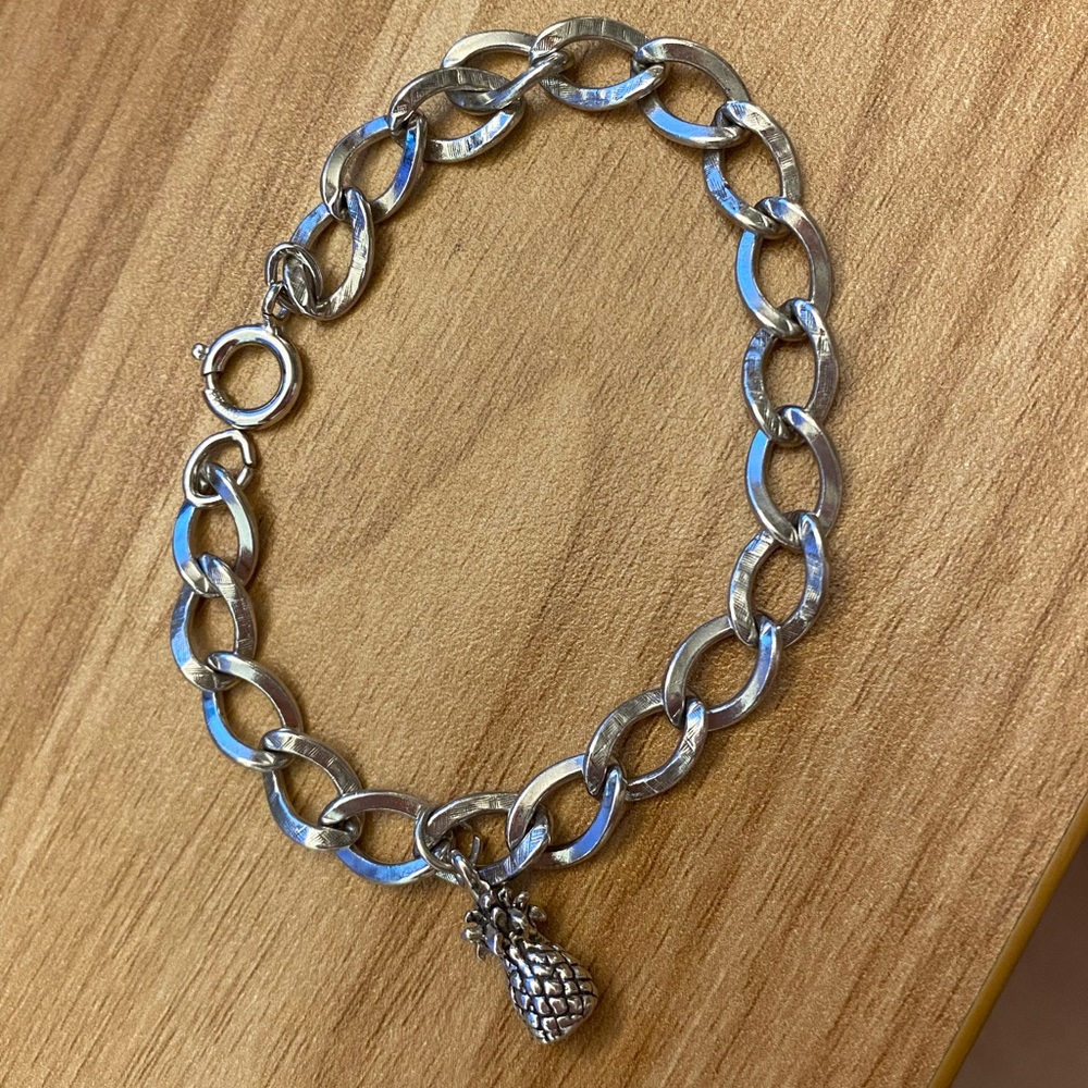 Delightful 925 Sterling silver curb chain charm bracelet with a pineapple charm!